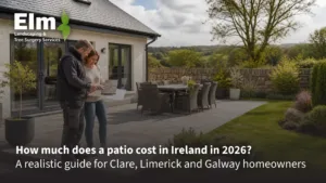 Elm Landscaping consultant reviewing patio plans with Irish homeowner outdoors